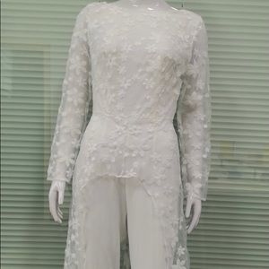 Pretty jumper with a flower train.